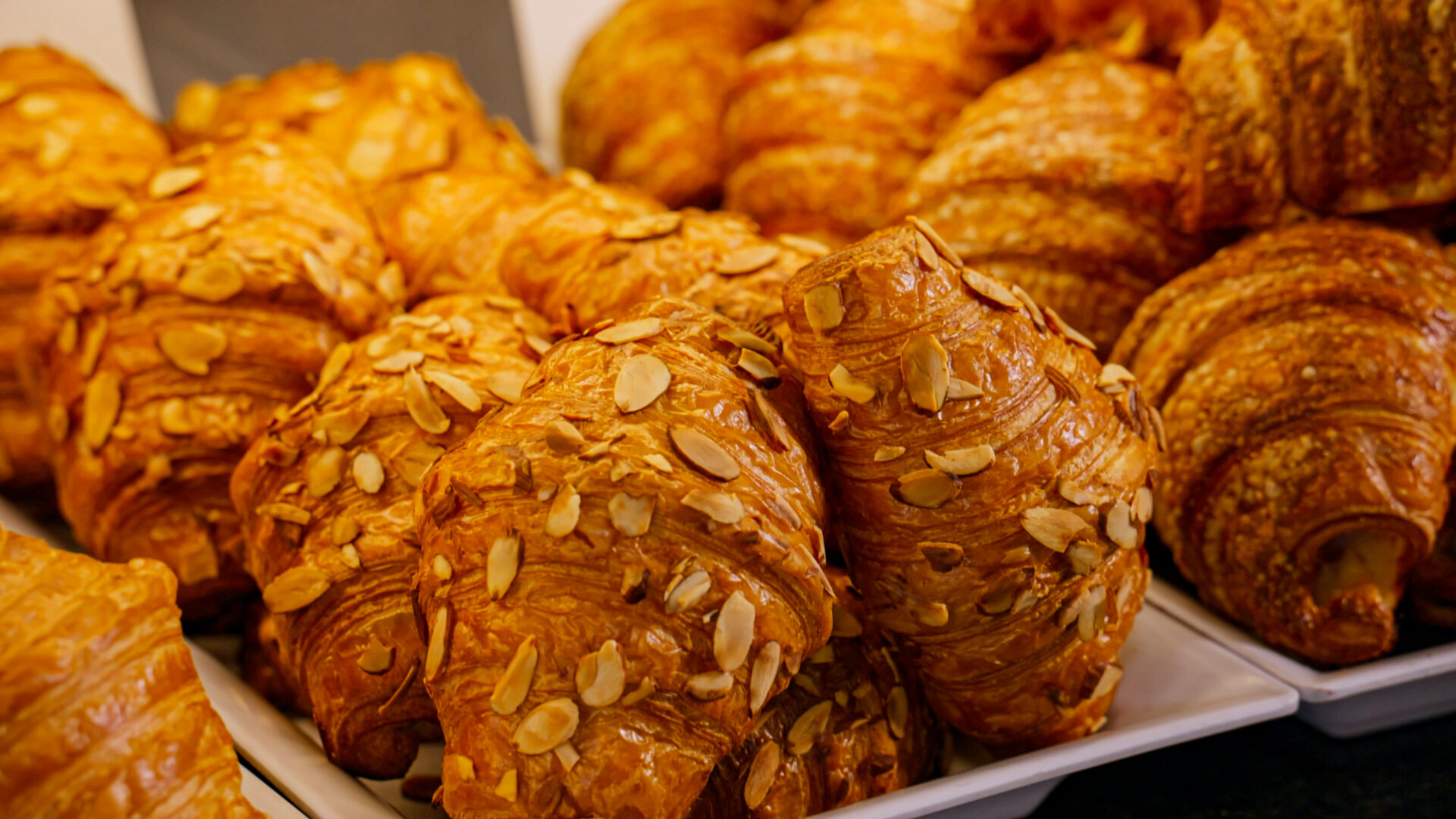 Fresh almond croissants and French pastries at French Press Bakery Needham MA